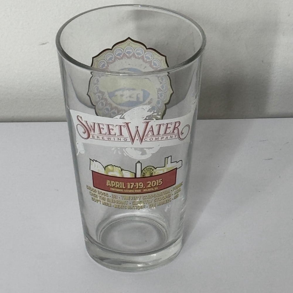Sweetwater Brewing Company Pint Glass with a Graphic for an April 2015 Music Fes